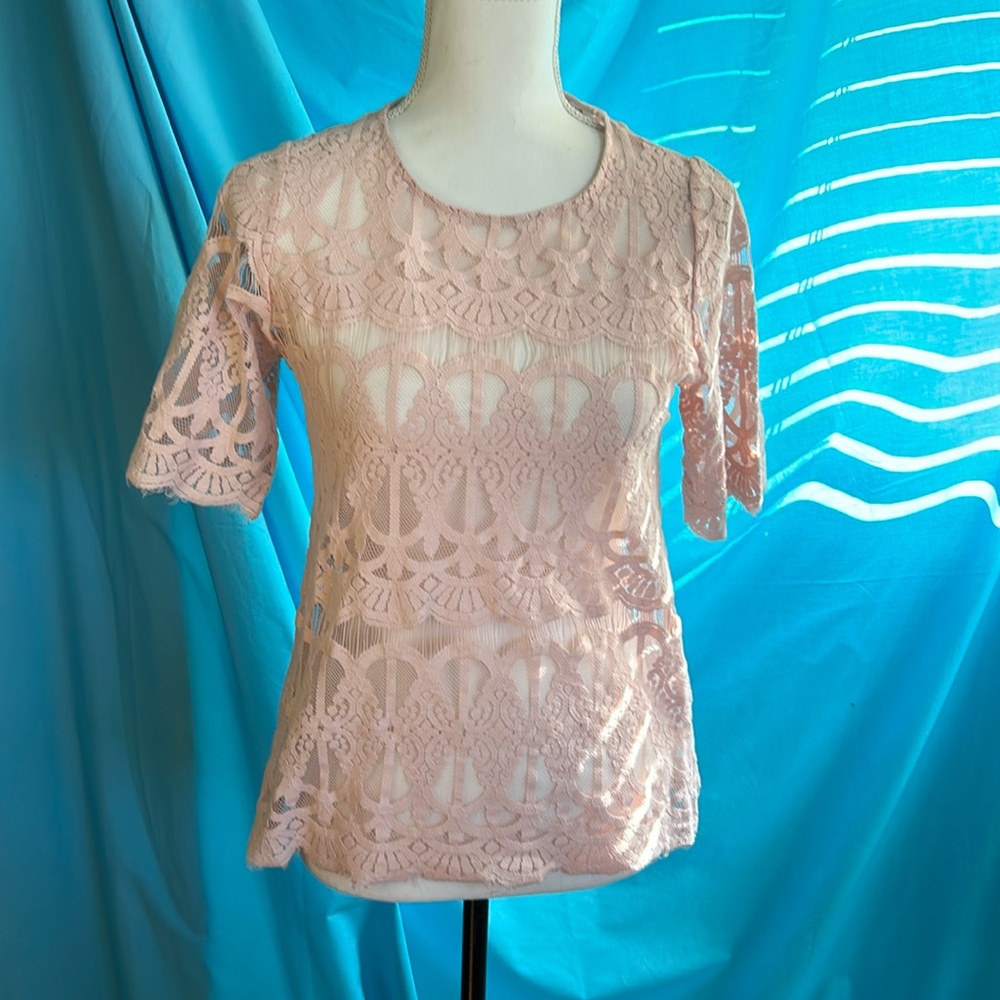 Buy2items get1free 3/$20items for$40. Peach lace round neck short sleeve top